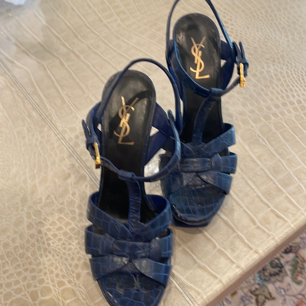 A pair of navy leather stamped crocodile open toe and sling bank shoes.